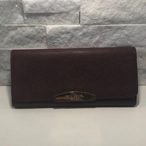 Henri Bendel leather flap wallet